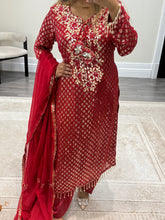 Load image into Gallery viewer, Red embroidered suit with foil work and mirror work embellishments with trouser and chiffon duppata