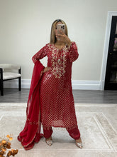 Load image into Gallery viewer, Red embroidered suit with foil work and mirror work embellishments with trouser and chiffon duppata