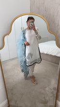 Load image into Gallery viewer, Blue and white Embroidered silk suit with embroidered organza duppata and trouser. And Matching purse Party wear. Eid collection.