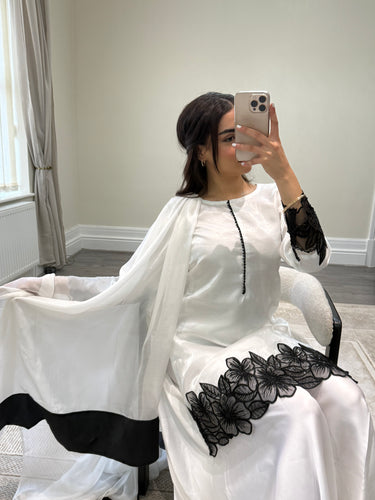 black and white embroidered raw silk suit with silk plazzo and chiffon duppata party wear suit