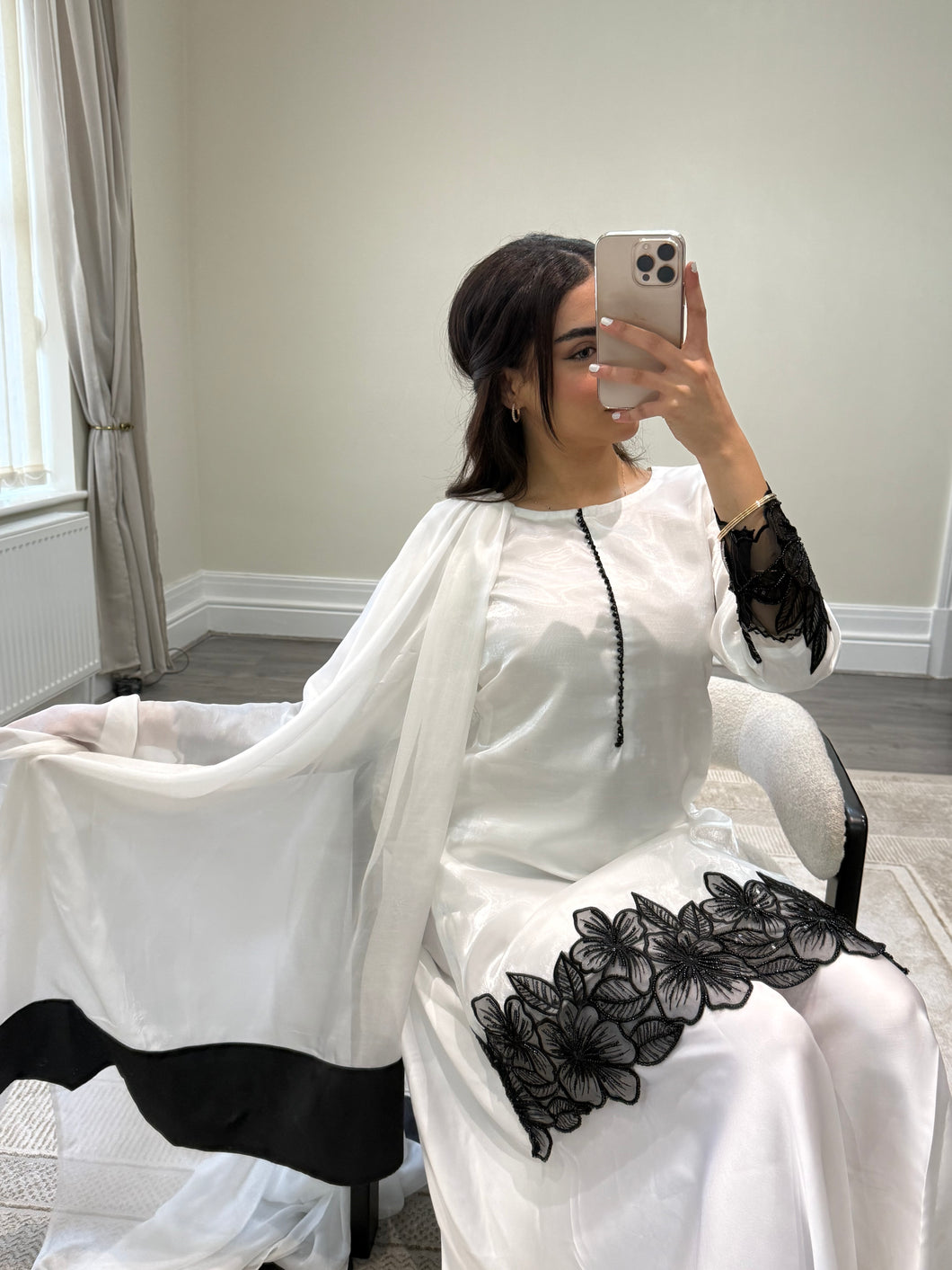 black and white embroidered raw silk suit with silk plazzo and chiffon duppata party wear suit