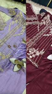Lilac organza shirt with embroidery and silk wide leg trouser.
