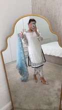 Load image into Gallery viewer, Blue and white Embroidered silk suit with embroidered organza duppata and trouser. And Matching purse Party wear. Eid collection.