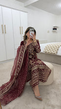 Load image into Gallery viewer, Maroon embroidered suit with full embellishment detailing and organza embroidered duppata. Crepe trouser. Eid collection and party wear