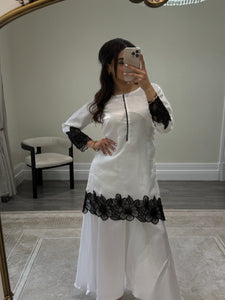 black and white embroidered raw silk suit with silk plazzo and chiffon duppata party wear suit
