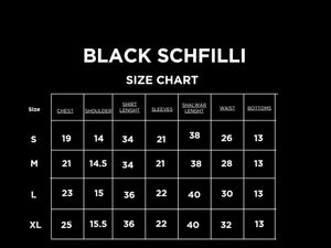 Black schiffli suit with chikankari embroidery and duppata.