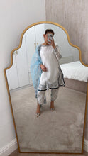 Load image into Gallery viewer, Blue and white Embroidered silk suit with embroidered organza duppata and trouser. And Matching purse Party wear. Eid collection.