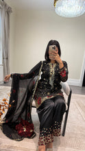 Load image into Gallery viewer, Black/ white chiffon embroidered suit with sequin embroidery and embellishments. Chiffon duppata. Eid and party wear.