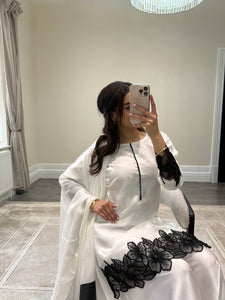 black and white embroidered raw silk suit with silk plazzo and chiffon duppata party wear suit