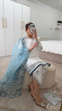 Load image into Gallery viewer, Blue and white Embroidered silk suit with embroidered organza duppata and trouser. And Matching purse Party wear. Eid collection.