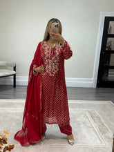 Load image into Gallery viewer, Red embroidered suit with foil work and mirror work embellishments with trouser and chiffon duppata