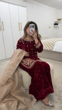Load image into Gallery viewer, Red velvet embroidered suit with mirror work and wid leg trouser and organza duppata. Eid collection party wear