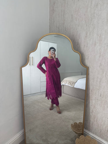 Fuschia lawn embroidered suit and cotton net duppata and trouser.
